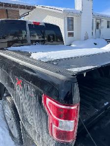 5.5 ft truck bed hard trifold  cover