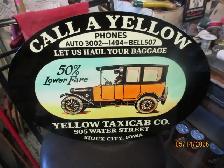 YELLOW TAXICAB CO. IOWA MODEL T TIN OVAL SIGN $150 MANCAVE DECOR