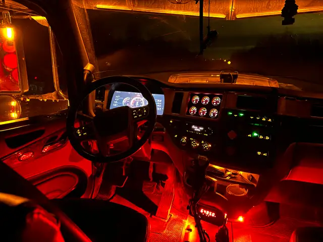 log truck driving position - Photo 3