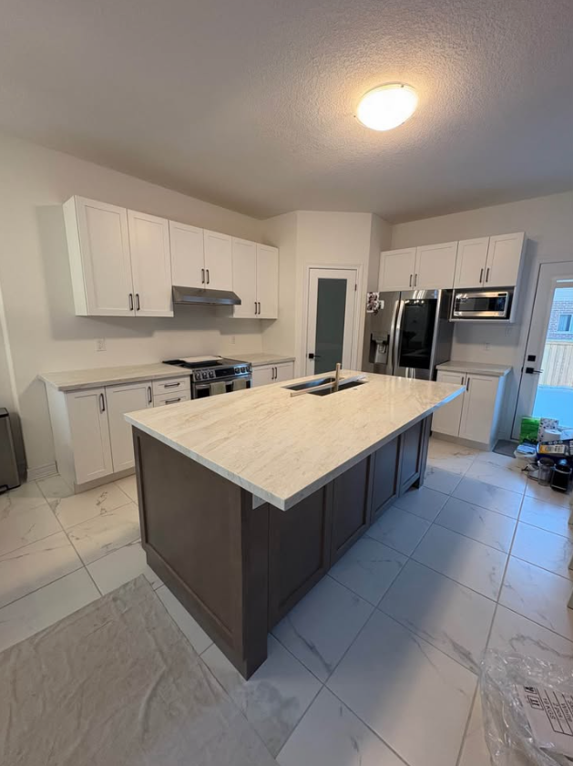 White Countertop With Veins 437-522-8447