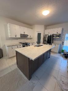White Countertop With Veins 437-522-8447