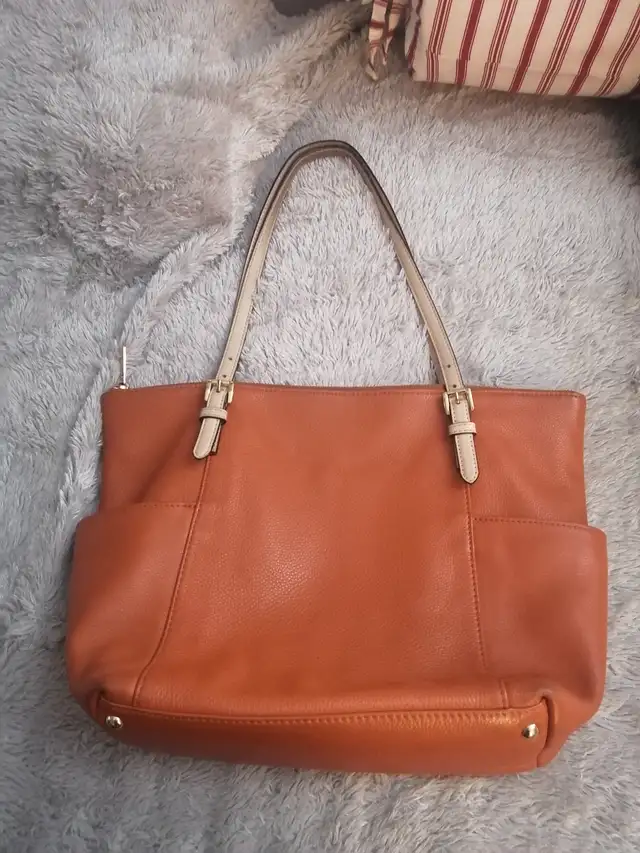 Orange Michael Kors purse and Daniel leather purse $15 each