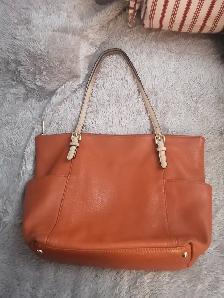 Orange Michael Kors purse and Daniel leather purse $15 each