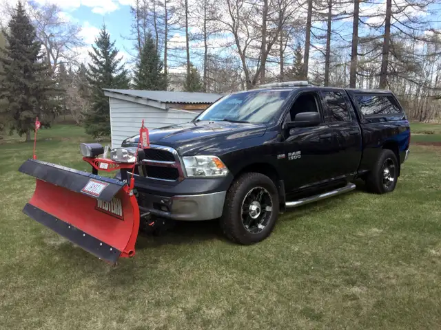 2015 Dodge RAM 1500 4x4 Quad Cab w/ Snow Plow