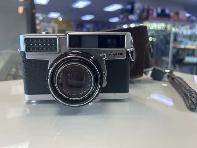 Fujica 35-SE SLR with case