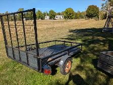 Trailer with drop down ramp