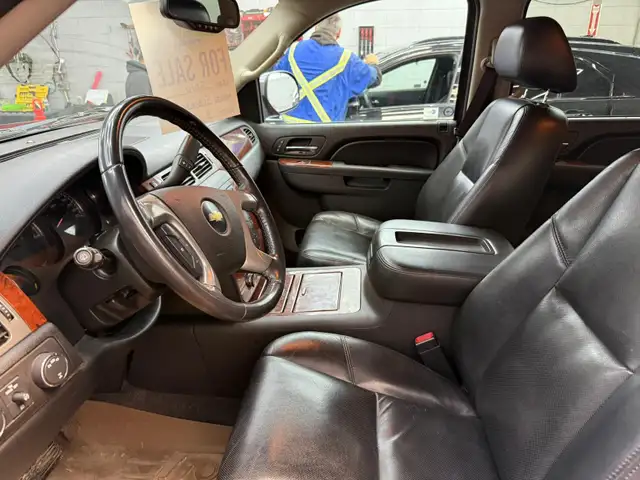 For sale:  2010 Chevrolet Suburban 1500 – Red Jewel Tintcoat
