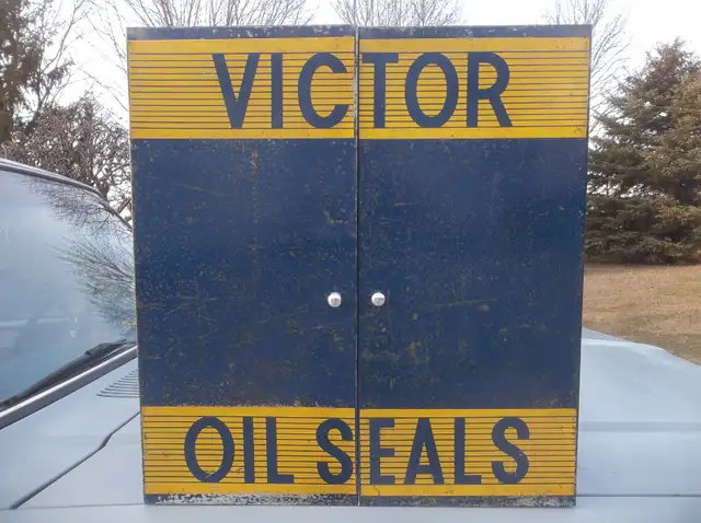 Vintage Victor oil seals cabinet ..... antique shop collectible