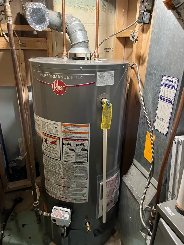 Hot water tank repair and installation - Photo 2