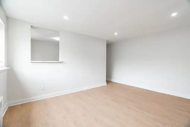 Spacious 2 Bed June 1st $1,495 Free heat & water Main floor - Photo 2