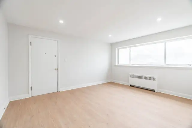 Spacious 2 Bed June 1st $1,495 Free heat & water Main floor - Photo 3