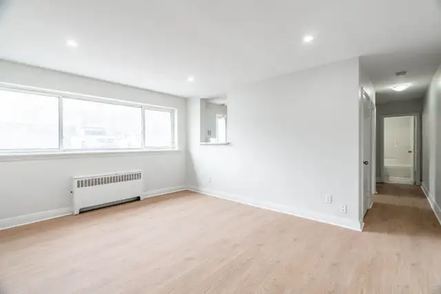 Spacious 2 Bed June 1st $1,495 Free heat & water Main floor - Photo 4