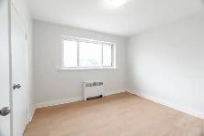 Spacious 2 Bed June 1st $1,495 Free heat & water Main floor - Photo 6