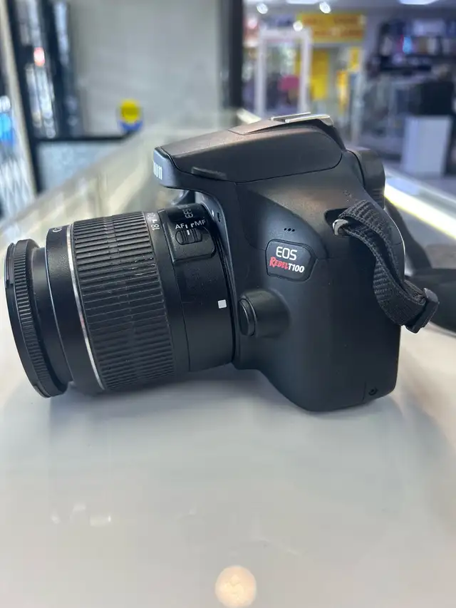 Canon T100 DSLR Camera with 18-55 lens and charger - Photo 3