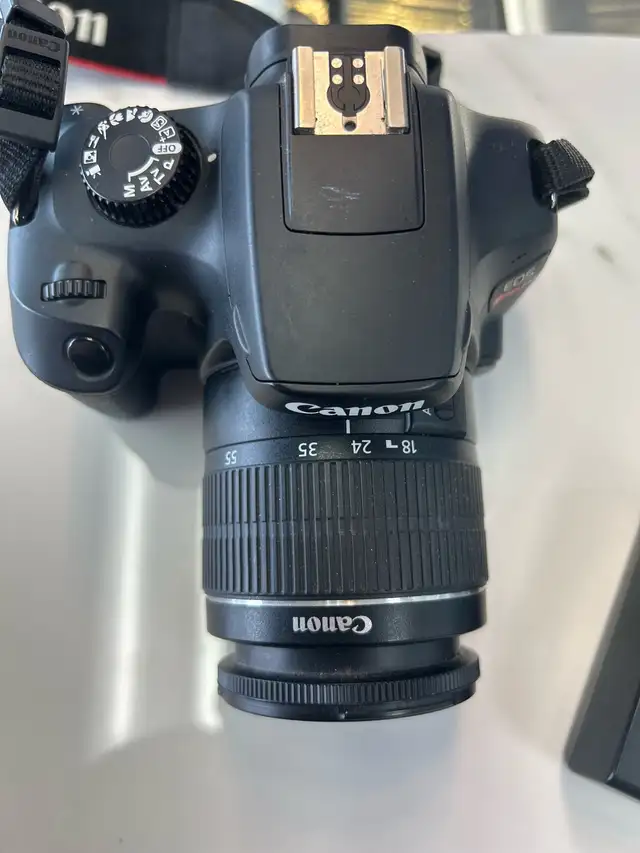 Canon T100 DSLR Camera with 18-55 lens and charger - Photo 6