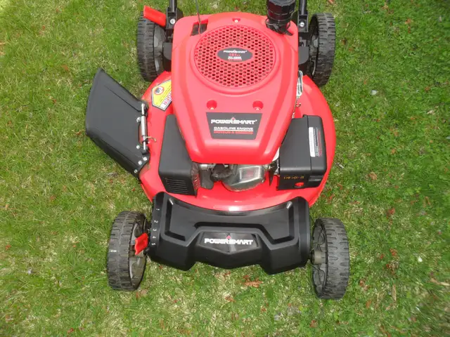 Gas powered lawn mower like new