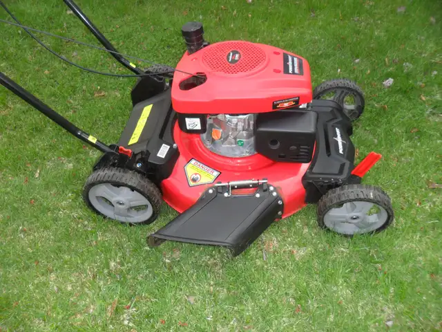 Gas powered lawn mower like new - Photo 2