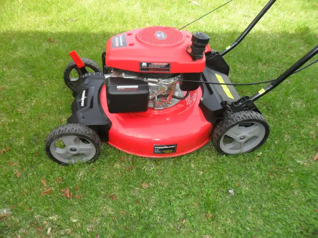 Gas powered lawn mower like new - Photo 3