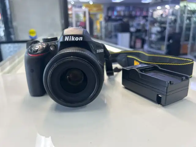 Nikon D3300 24.2MP DSLR with 35mm lens