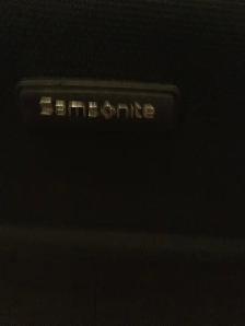 BLACK SAMSONITE SUITCASE
