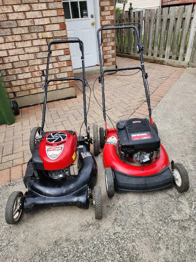 2 lawnmowers for parts