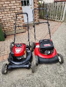 2 lawnmowers for parts