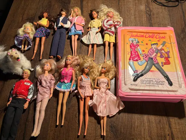 Vintage Barbies with lots of clothing