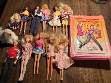 Vintage Barbies with lots of clothing