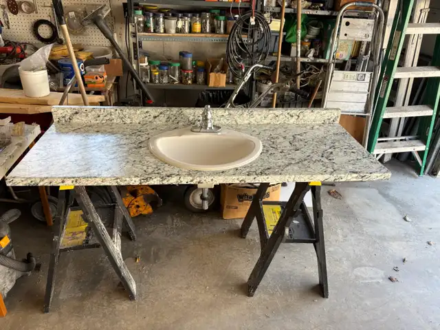 countertop and sink and taps
