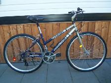 Vélo bicyclette hybride comme neuf