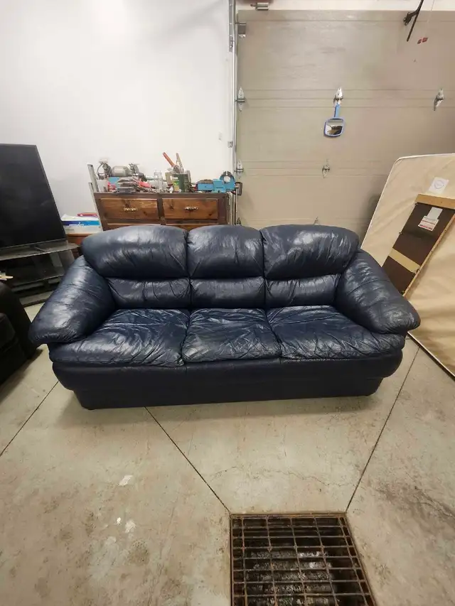 Blue leather couch with recliner chair