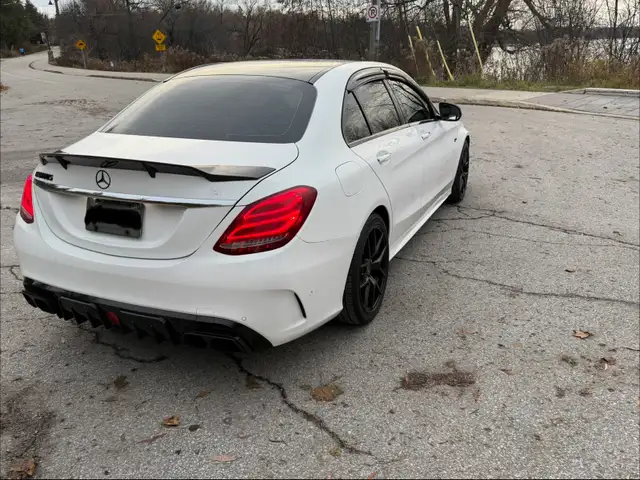 2017 Mercedes-Benz C 43 metallic white exterior black interior - Photo 6