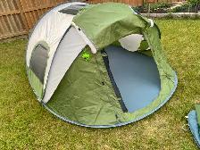 New, never used, 4 person Moon Lense Easy Pop-up Tent