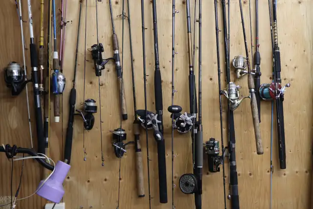 Big Jon Dowriger and Fishing rods and reels - Photo 3