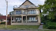 Take In Sunrise/Sunsets Along Waterfront from Private Balcony