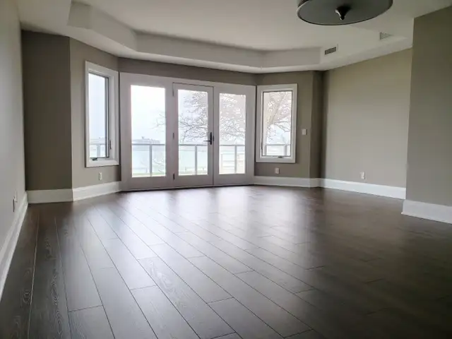 Take In Sunrise/Sunsets Along Waterfront from Private Balcony - Photo 4