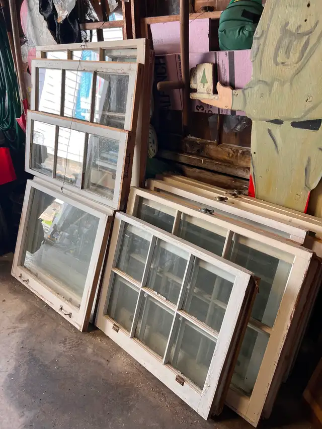 Wooden window sashes for sale.