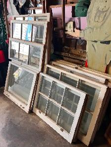 Wooden window sashes for sale.