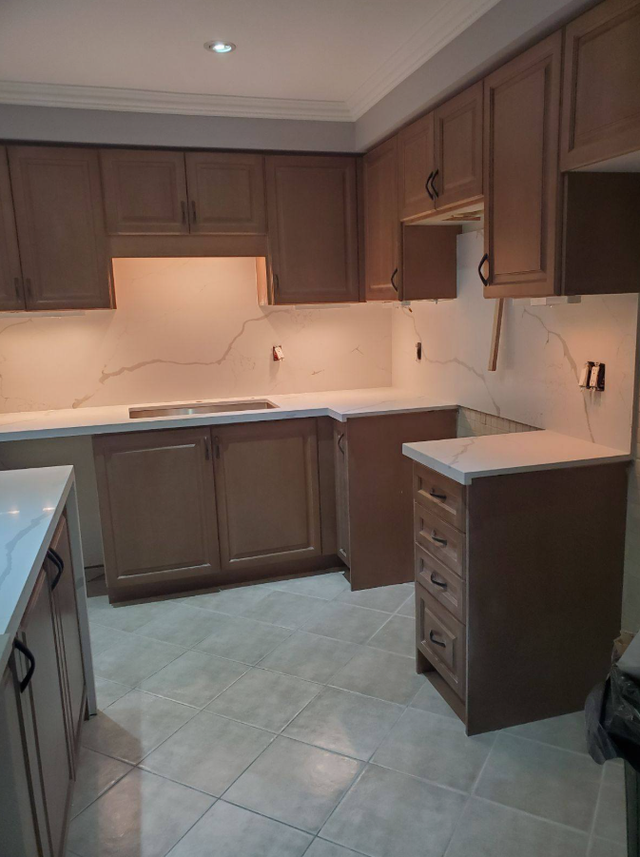 Plain White Countertop With Orange Island 437-522-8447