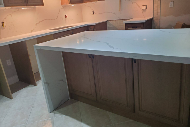 Plain White Countertop With Orange Island 437-522-8447 - Photo 3