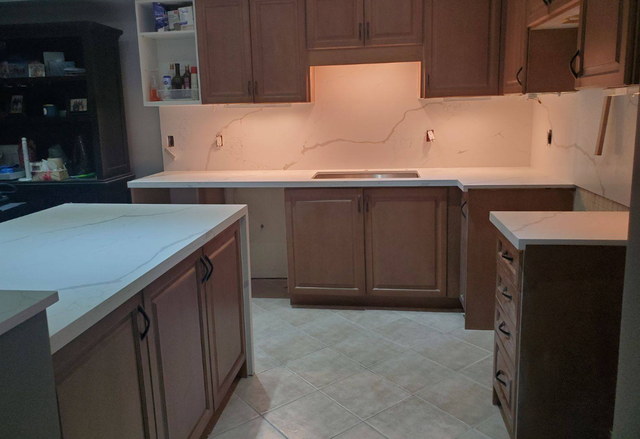 Plain White Countertop With Orange Island 437-522-8447 - Photo 4