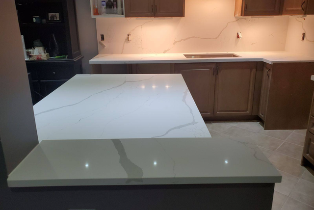 Plain White Countertop With Orange Island 437-522-8447 - Photo 5