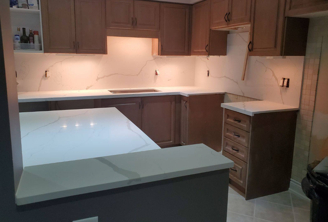 Plain White Countertop With Orange Island 437-522-8447 - Photo 6