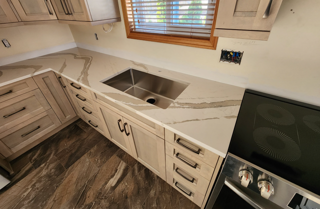White Countertop With Stylish Golden Blackish Veins 437-522-8447 - Photo 5