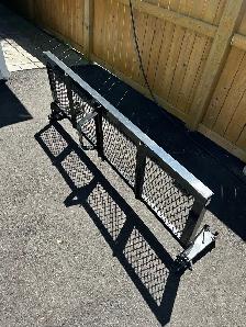 Folding tailgate storage rack.