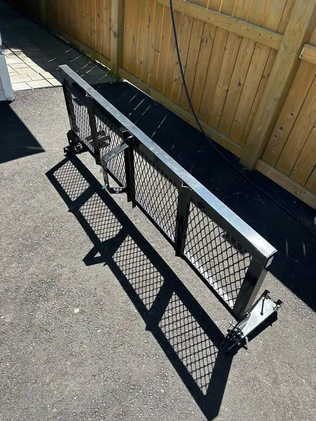 Folding tailgate storage rack. - Photo 2