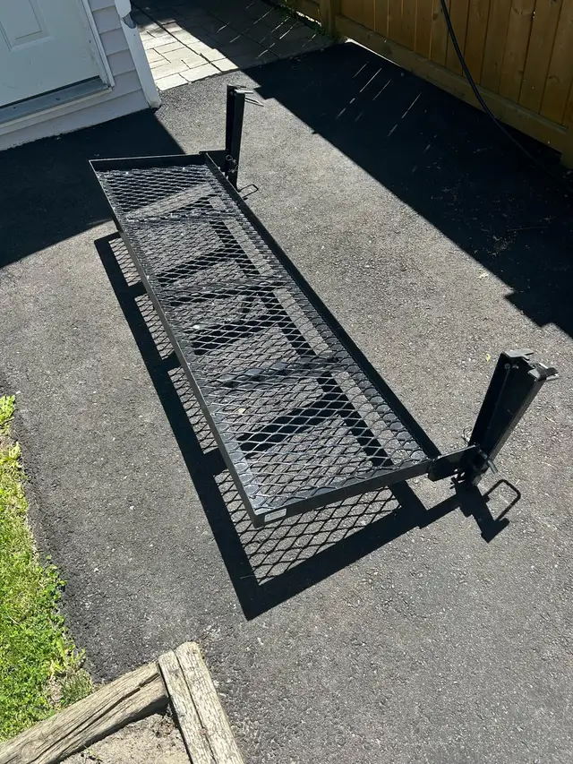Folding tailgate storage rack. - Photo 6