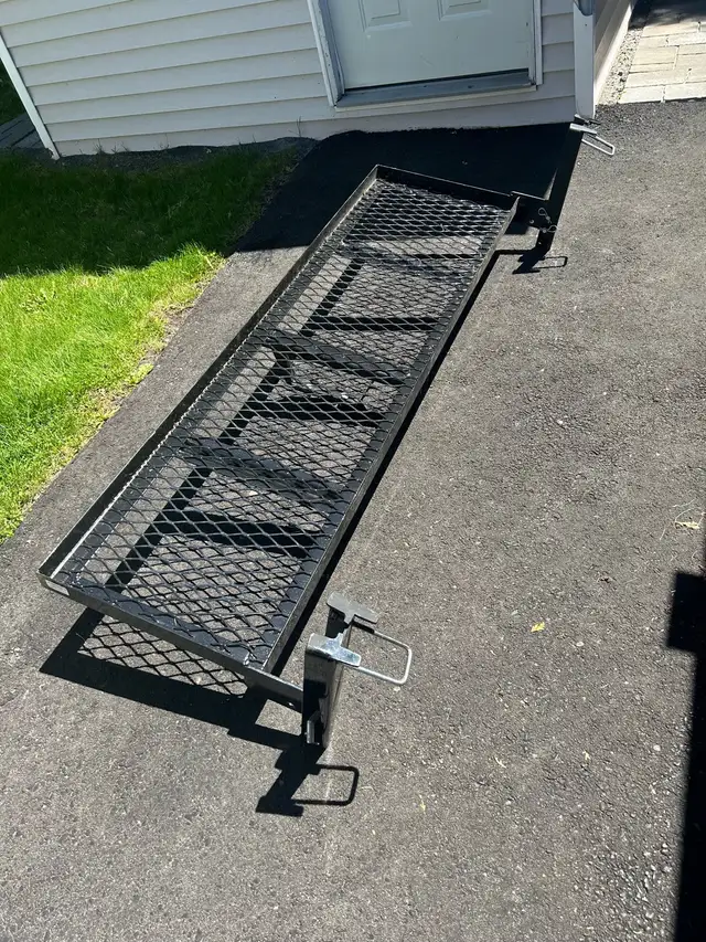 Folding tailgate storage rack. - Photo 7