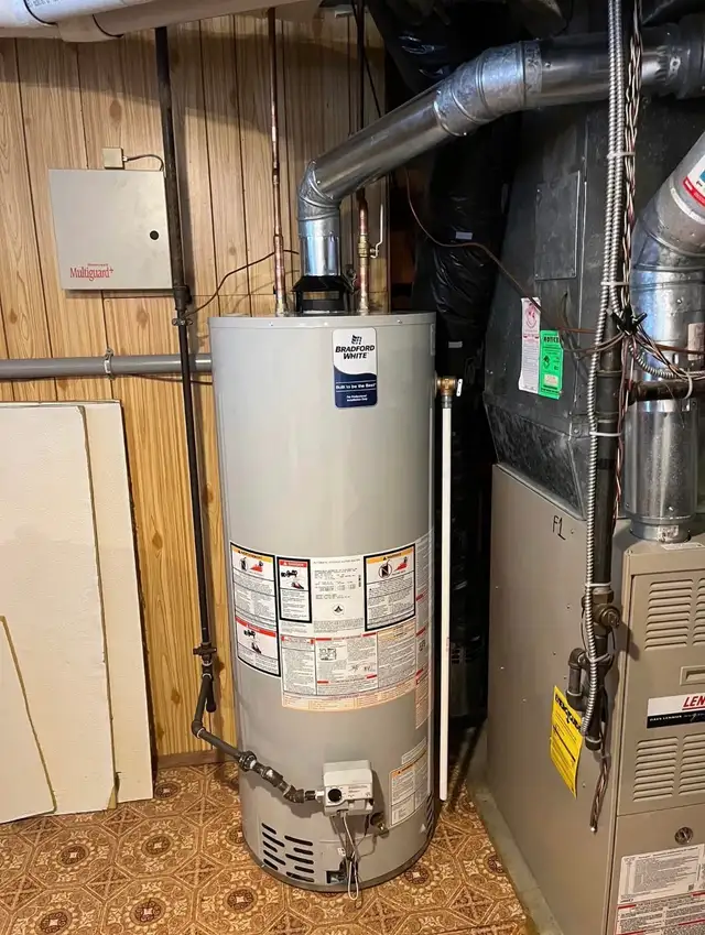 hot water tank installations - Photo 2