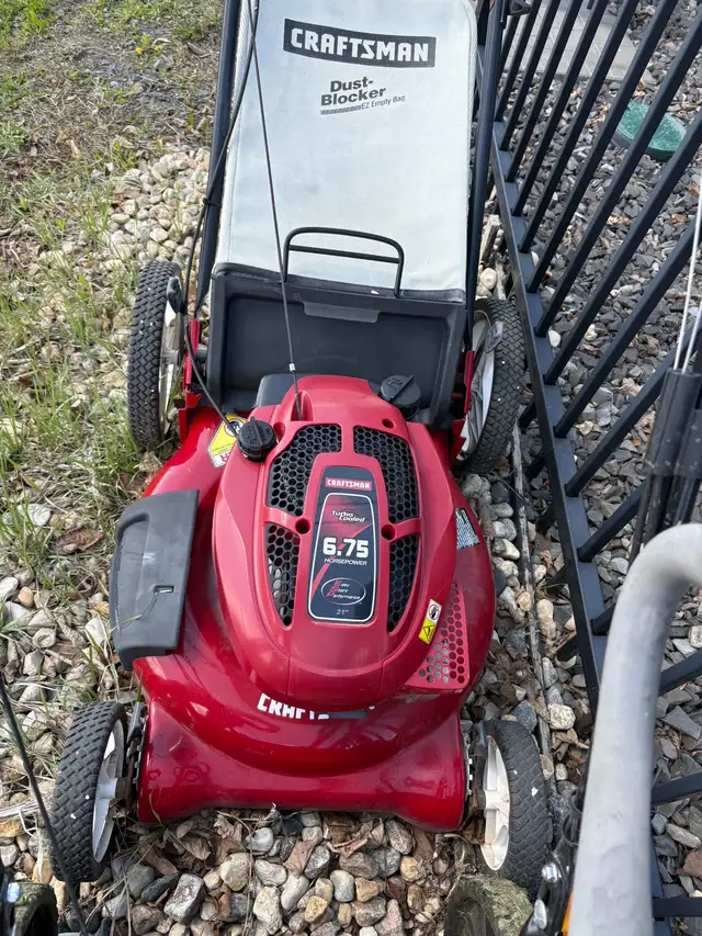 free lawnmower being picked up